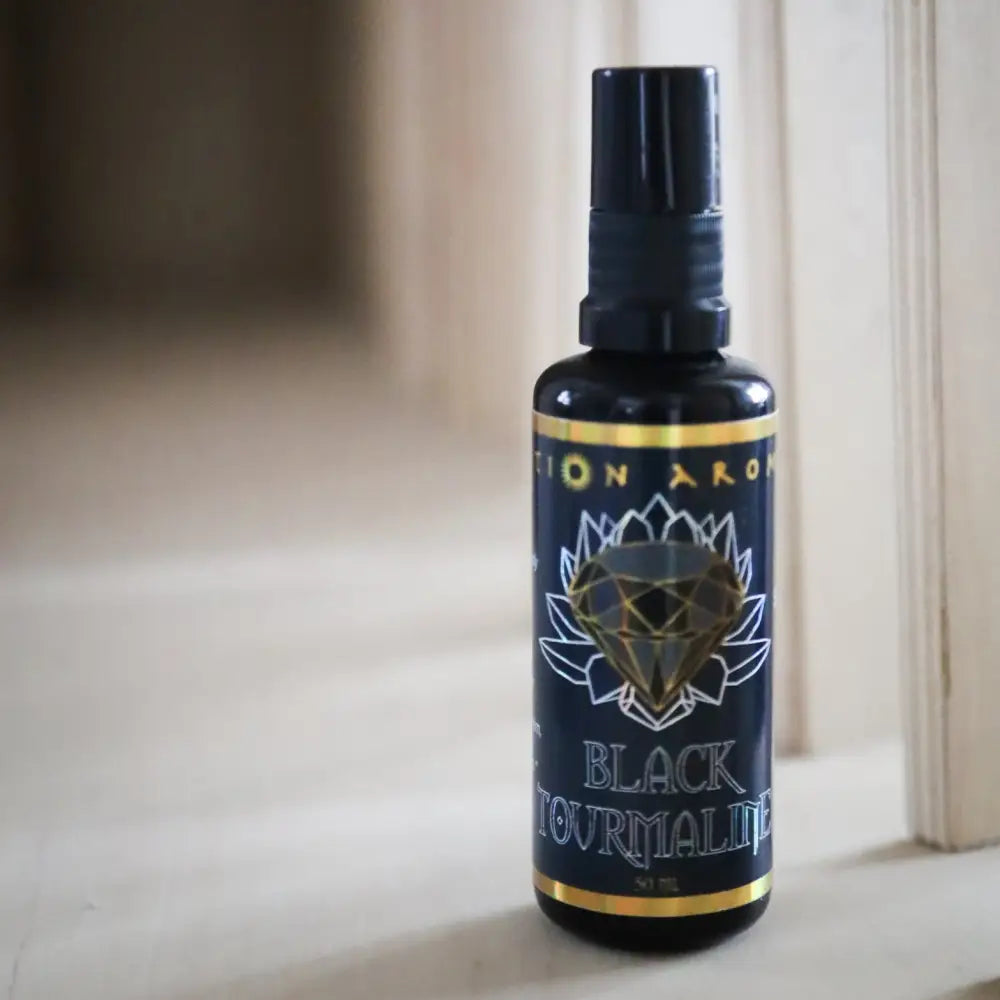 Black Tourmaline Mist spray bottle with gold accents and diamond label