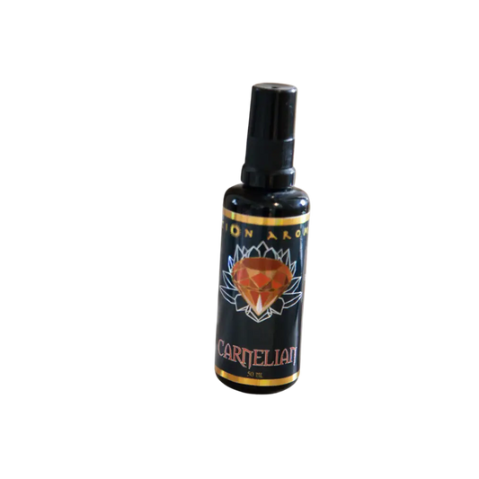 Carnelian Mist essential oil bottle with lotus flower design and black label