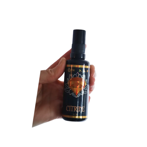 Citrine Mist black spray bottle with gold and orange design