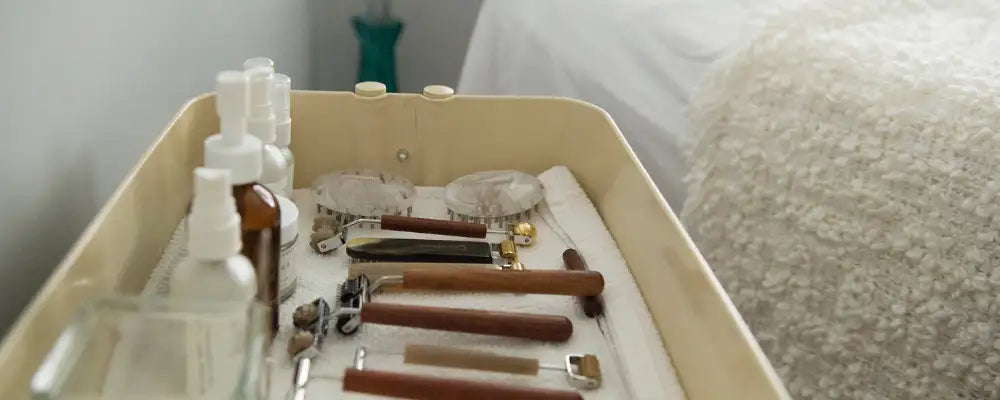 Cream-colored tray with various grooming tools and bottles.