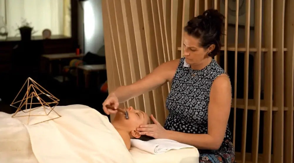 Gold pyramid geometric decor with metallic finish from Infinity Facial Series