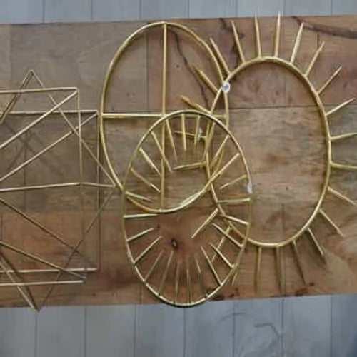 Gold sunburst wall art with intricate rays in Krystaline 9’’ bundle