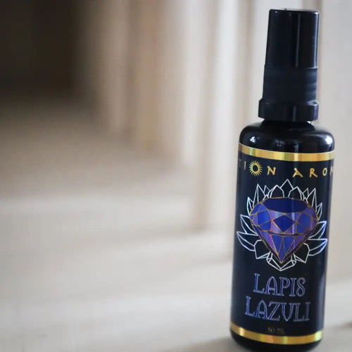 Lapis lazuli essential oil spray bottle with dark blue label and purple diamond design in Lapis Lazuli Mist