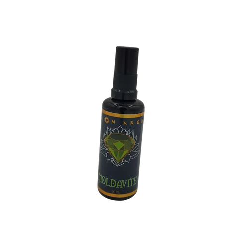 Dark green and black Moldavite Mist bottle with diamond label
