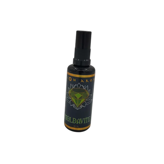 Dark green and black Moldavite Mist bottle with diamond label
