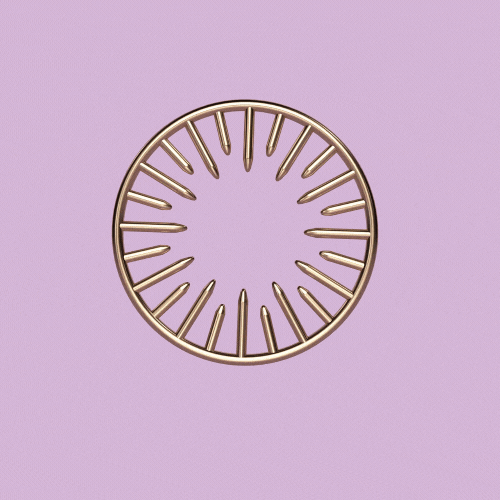 Gold circular metal trivet with spikes, neutralizing ring