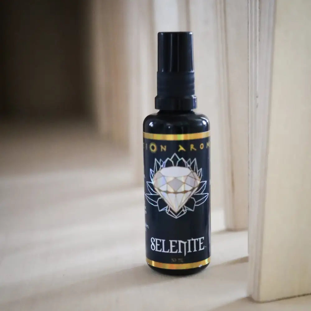 Selenite mist black spray bottle with gold accents and diamond design