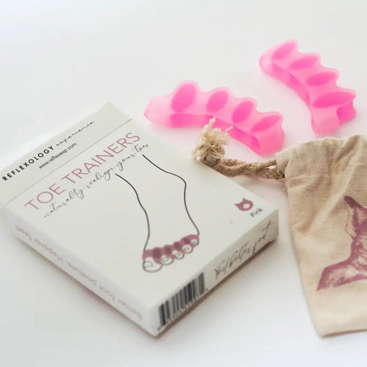 Pink silicone Toe Trainers in beige drawstring bag
