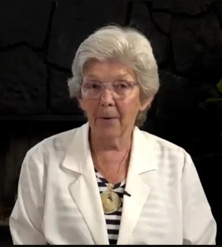 White lab coat with striped shirt and necklace