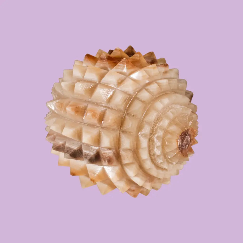 Seashell ball ornament with spiral design in natural beige tones, Yang Health Ball No. 432
